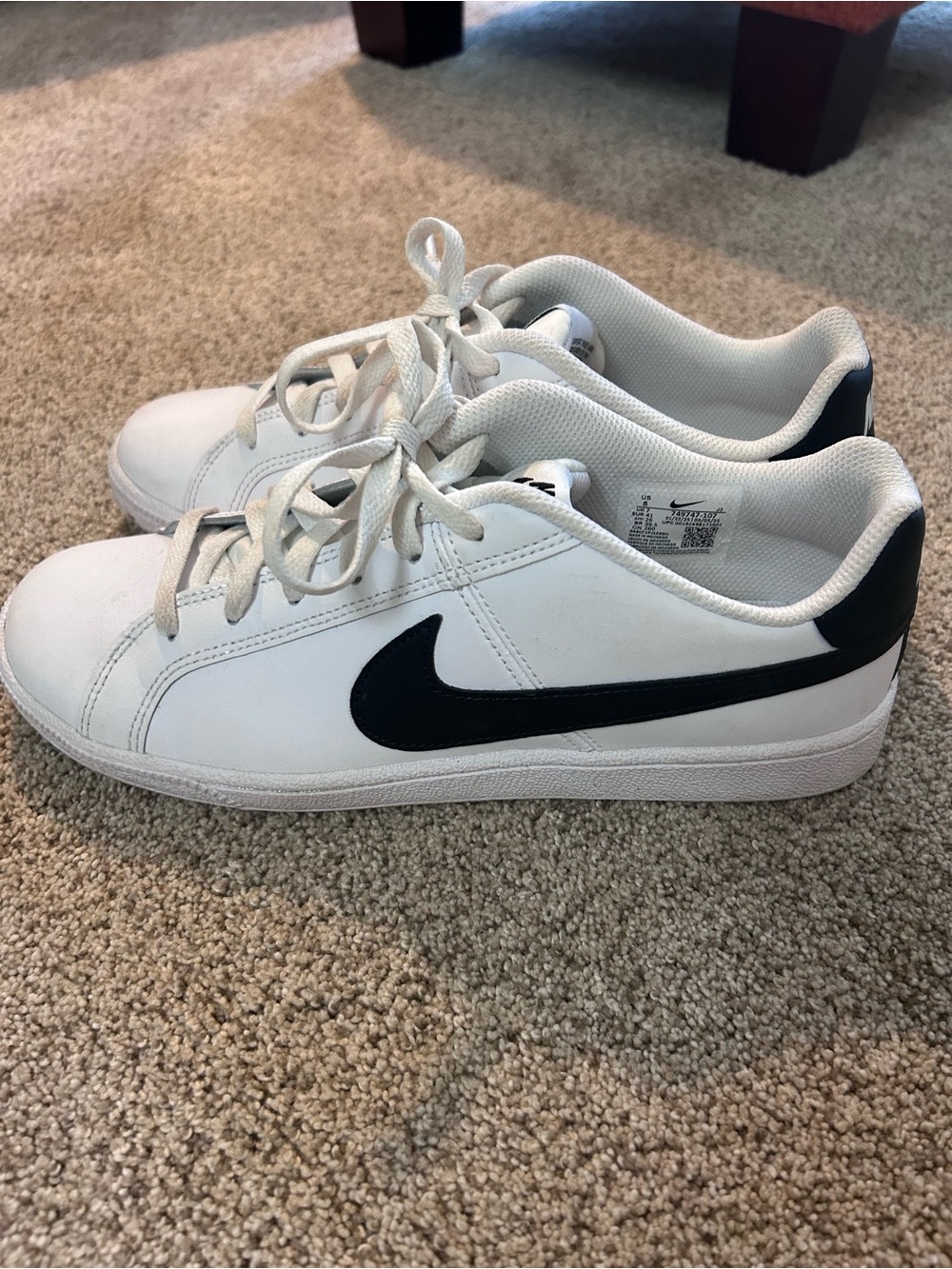 Nike Kids White Sneakers with Black Swoosh Accent